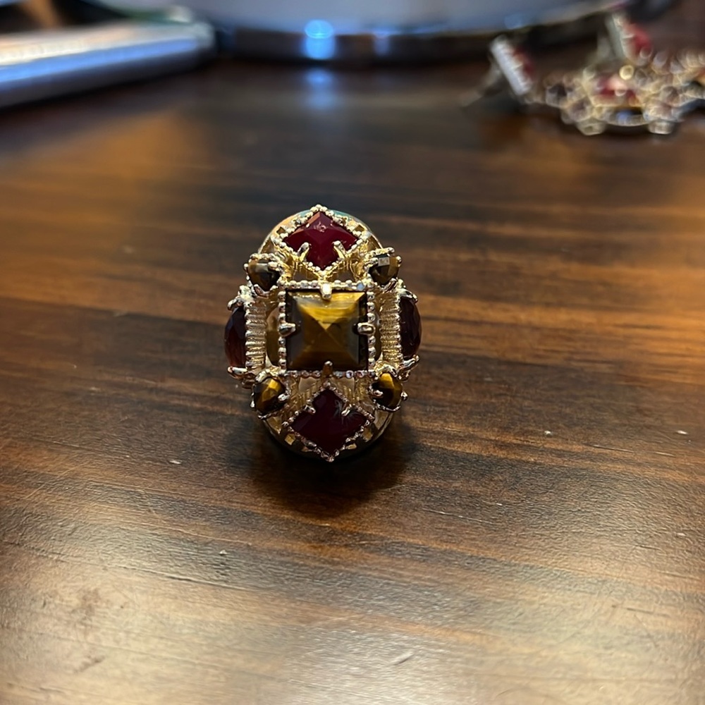 Maroon and tigers eye ring, slight tarnish on back of band